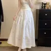 Saia Estampada Floral para Mulheres 2026 Novo Estilo de Verão, Levemente Plus Size, Cintura Elástica, Cobre o Quadril, Emagrecimento, Saia de Comprimento Médio