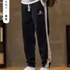Calças de veludo cotelê masculinas para exportação, novo estilo outono/inverno, corte solto, forradas com fleece, espessadas para aquecimento, calças jogger esportivas