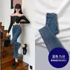 Jeans ajustados de cintura alta adelgazantes para mujer 2024 primavera modernos versátiles nuevos pantalones acampanados cortos