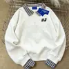 Moletom Versátil Estilo Americano Preguiçoso Casual, Gola Polo, Falso Duas Peças para Mulheres, Outono e Inverno 2025, Forrado com Fleece, Corte Solto