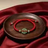 Pulsera Cuerda Roja Hebilla de la Paz Jade Jade Tejida a Mano Cuerda de Mano Cuerda de Cuero Joyería de Mano Ajustable Estilo Pareja