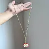 Collar Casual de Cuerda Trenzada con Cuentas de Corazón Largo para Mujer 2025 Nuevo Estilo Étnico Retro Diseño de Nicho Cadena para Suéter