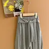Nuevo atuendo de otoño para niñas: Suéter cárdigan de punto con estampado de leopardo, versátil con una falda a juego, pantalones casuales y un conjunto de dos piezas para niños mayores