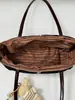Bolso tote minimalista de nicho estilo coreano 2026 nuevo modelo bolsa de gran capacidad para debajo del brazo bolso de hombro de color liso retro de nicho para commuting