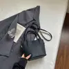 Bolso tipo cubo estilo relajado nuevo de verano 2026, Bolso cruzado de moda único y moderno para mujer, Bolso de mano elegante de alto valor