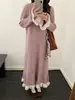 Vestido de punto de manga larga con volantes de color contrastante, estilo nuevo Otoño/Invierno 2026 para mujer, suave y holgado, estilo suave Vestido suéter