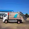 Camión compactador de basura Dongfeng Dolic de 8 toneladas 10 toneladas Camión compactador de basura de saneamiento Camión de eliminación de basura compactada de 9 metros cúbicos