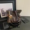 Bolsa Feminina 2026 Outono Novo Modelo Uso Diário Deslocamento Cor Sólida Simples Nicho Estiloso Grande Capacidade Bolsa de Ombro com Corrente