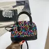 Bolsa de concha com lantejoulas em cores degradê, nova coleção de outono 2026, bolsa de mão simples e estilosa, bolsa de ombro da moda e bolsa transversal