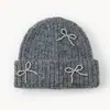Estilo Novo Outono e Inverno Chanel-Inspirado Cor Sólida Laço Versátil Feminino Circunferência da Cabeça Grande Aconchegante Espesso Proteção de Orelhas Gorro de Tricô