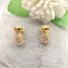 Stock de comercio exterior piezas de cobre personalizadas retro oro full diamond piña pendientes de botón collar joyería para mujeres