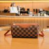 Bolsa retrô simples 2023nova bolsa de comércio exterior atacado bolsa feminina bolsa de ombro de estudante impressa bolsa de cilindro de nicho feminina