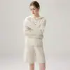 Suéter de cachemira 2026 Estilo Otoño/Invierno para mujer con capucha tejido de ochos capa base estilo dulce conjunto de dos piezas suéter cálido de temperamento