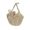 Bolso de hombro tejido casual para mujer, nuevo bolso de paja calado, bolso de mano casual estilo estudiante para playa