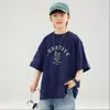 Traje de mezclilla de verano para niños, nuevo conjunto de dos piezas de manga corta y shorts estilo coreano para niños mayores, ropa de verano moderna y a la moda