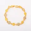 Bestseller transfronterizo: Pulsera estilo francés europeo y americano, lujo ligero con un toque de alta gama, llena de circonita, pulsera de flor colorida, joyería de aleación