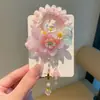 Accesorios para el cabello Hanfu de estilo chino para niños, cintas para el cabello de flor roja etéreas y de estilo antiguo, adecuadas para moños y coletas