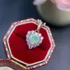 Colgante de ópalo blanco natural para mujer, moda, piedra principal de 6 mm, Europa y Estados Unidos, el más vendido, venta al por mayor directa de fábrica, incrustación de plata s925