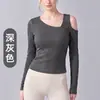 Camiseta de manga larga para mujer para yoga con cuello asimétrico y diseño hueco, nueva camiseta básica ajustada de otoño sin hombros, top de Pilates para mujer
