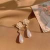 Aretes Coreanos Populares de Camelia Simple con Perla para Mujer ins Estilo Frío Nicho Retro Moderno Aguja de Plata S925