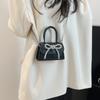Bolsa Mini de Mão Texturizada Estilo Coreano 2025 Menina Laço Corrente Batom Fone de Ouvido Transversal Moderna
