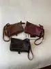 A bolsa pequena popular deste ano para mulheres, versátil para o outono, nova bolsa transversal da moda 2026, versão coreana ins bolsa quadrada pequena