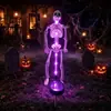 Luces de cadena de Halloween transfronterizas, luces de suelo de calavera, luces decorativas de ambiente para patio exterior y césped alimentadas por energía solar, esqueleto simulado