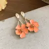 Las flores de primavera están en plena floración~ Pendientes de flor de gota de aceite de aguja de plata con un diseño único, hermosos y dulces, pendientes súper bonitos para mujer