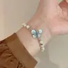 Pulsera de Perlas y Mariposas con Cuentas Estilo Francés Lujo Ligero Gama Alta Nuevo Diseño de Nicho Versátil Joyería de Pulsera Elegante