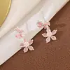 Nuevos Pendientes 2025 Zirconia Incrustada Pendientes de Flor y Mariposa Colgante Largo Fresco Accesible Lujo Bobina de Mosquito Clip para Oreja