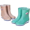 Botas de lluvia para mujer con forro polar, zapatos cálidos para todas las estaciones, zapatos impermeables de moda, zapatos de algodón de tubo alto antideslizantes, botas de lluvia, cubrezapatos de goma para invierno