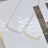 Cadena de Clavícula Elegante Bañada en Oro Real con Circonita Microincrustada Diseño de Nicho Femenino Sentido del Diseño Geométrico Collar con Letra W Collar Distintivo