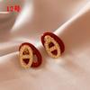 Aretes rojos de alta gama aretes únicos para mujer aretes estilo occidental 2023 nuevos aretes geométricos de nicho populares de moda