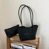 Nova bolsa feminina transfronteiriça, elegante 2026 bolsa de ombro versátil simples de grande capacidade, bolsa de balde vazada mãe e filho