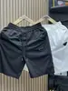 Pantalones cortos de seda helada de estilo europeo, pierna recta, frescos, de secado rápido para hombre, verano, finos, transpirables, versátiles, elegantes, shorts de playa