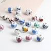 Accesorios de joyería diy cuentas de cerámica de agujero grande cuentas de porcelana con aplique Jingdezhen 10mm azul y blanco floral cuentas sueltas materiales hechos a mano