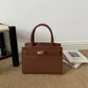 Outono 2026 Nova Moda Luxo Leve Alto Valor Padrão Trançado de Palha de Trigo Elegante Versátil Bolsa de Ombro Transversal Bolsa Kelly