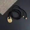 Otoño e Invierno Diseño Nicho Forma de Concha Sensación de Textura Collar Aretes Sentido Avanzado Cuerda Negra Tejida Cadena de Lana Cadena para Clavícula