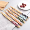 Palillos de bambú natural para uso doméstico, resistentes al moho, antideslizantes, con pequeños patrones florales, ecológicos, resistentes a altas temperaturas, palillos de madera sin pintura ni cera para restaurantes