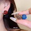 Pendientes de aro redondos con lunares y efecto de goteo de aceite estilo coreano ins, pendientes retro de alta gama de moda con un diseño único para mujer