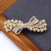 Horquilla de aleación con clip de resorte de perla de Corea del Sur y diamantes de imitación, elegante horquilla con lazo, tocado estilo Chanel, accesorios para el cabello para mujer