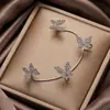 Pendientes de mariposa con clip para las orejas, de una pieza, de estilo superllamativo de Dongdaemun, de Corea del Sur. Pendientes de hada de alta gama que combinan con todo, sin agujeros para las orejas.
