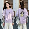 Camiseta de manga longa de algodão puro para meninas, um top moderno com estampa de desenho animado e visual em camadas, novo estilo primavera/outono, versão coreana, camiseta de baixo para crianças