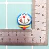 Accesorios de resina para bricolaje con expresión de dibujos animados de cara brillante, serie Doraemon azul, pegamento en crema, funda para teléfono móvil, horquilla, pegatina para refrigerador