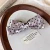 Pinza para el pelo de satén con lazo de lunares estilo coreano, un accesorio para el cabello suave y femenino para crear peinados elegantes, una pinza para el pelo versátil para el uso diario para mujeres