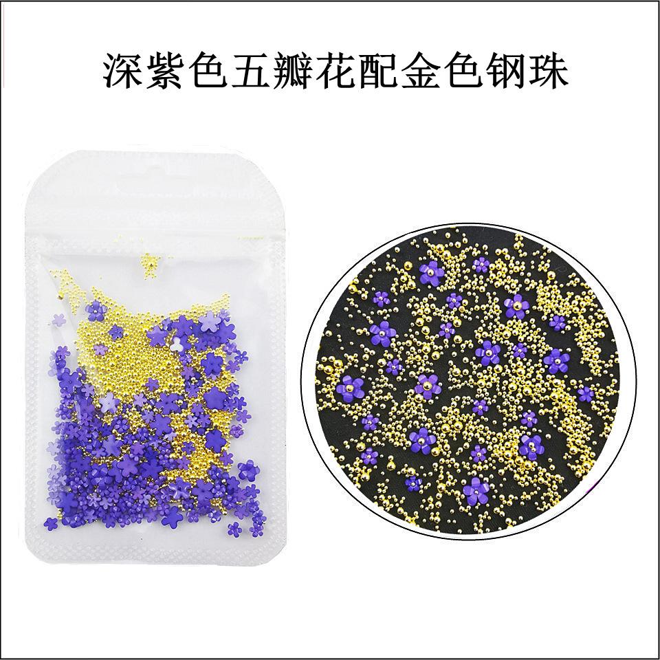 深紫色花朵配金色钢珠
