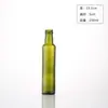 Mancha verde oscuro 500 ml botella cuadrada de aceite de camelia medio gato de peso Botella vacía sellada con boca redonda de seda Marrón