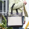 Bolsa tote grossa de alta qualidade semi-transparente para embalagem de presente de loja de roupas suporta impressão de logotipo de gráfica em estoque atacado