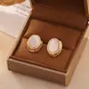 Brincos de Concha Estilo Francês Retrô Estilo Hong Kong Luxo Acessível Brincos Ovais de Alta Qualidade para Mulheres Agulha de Prata S925 Brincos Exquisitos