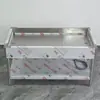 Mesa de trabajo para productos de pato estofado en acero inoxidable y alimentos estofados listos para comer, mostrador de ventas de productos de pato, mesa de enfriamiento con malla ultragruesa